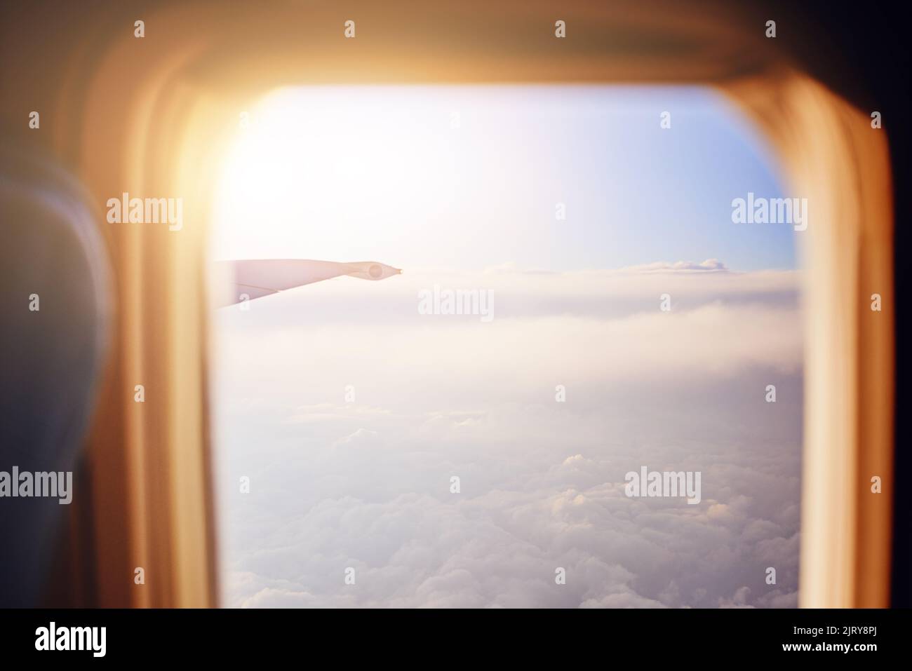 Time to make some memories all over the world. the view through an airplane window. Stock Photo