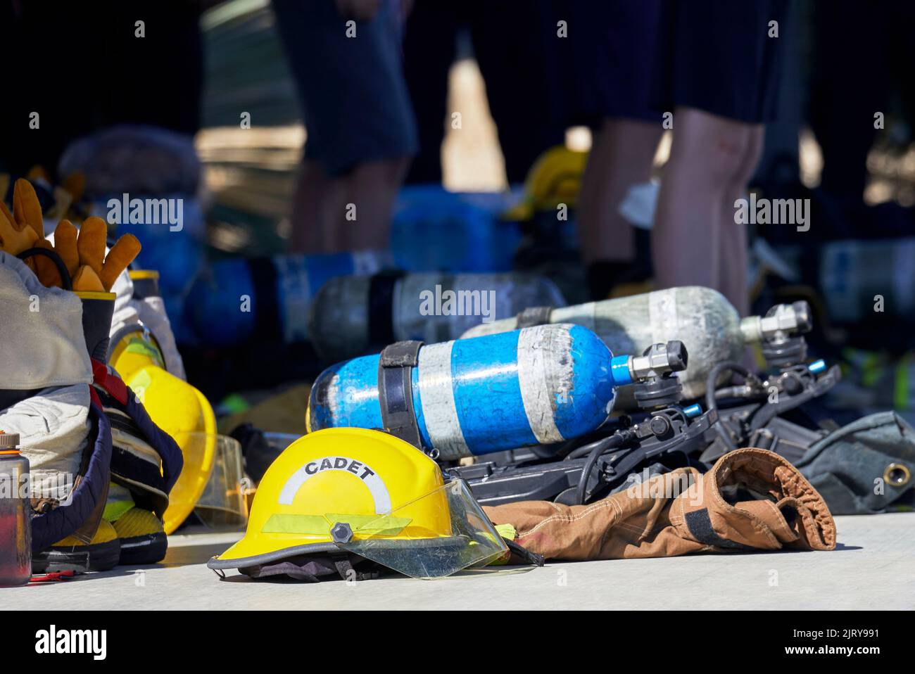 Newly recruited cadet fire firefighters in training with equipment Stock Photo