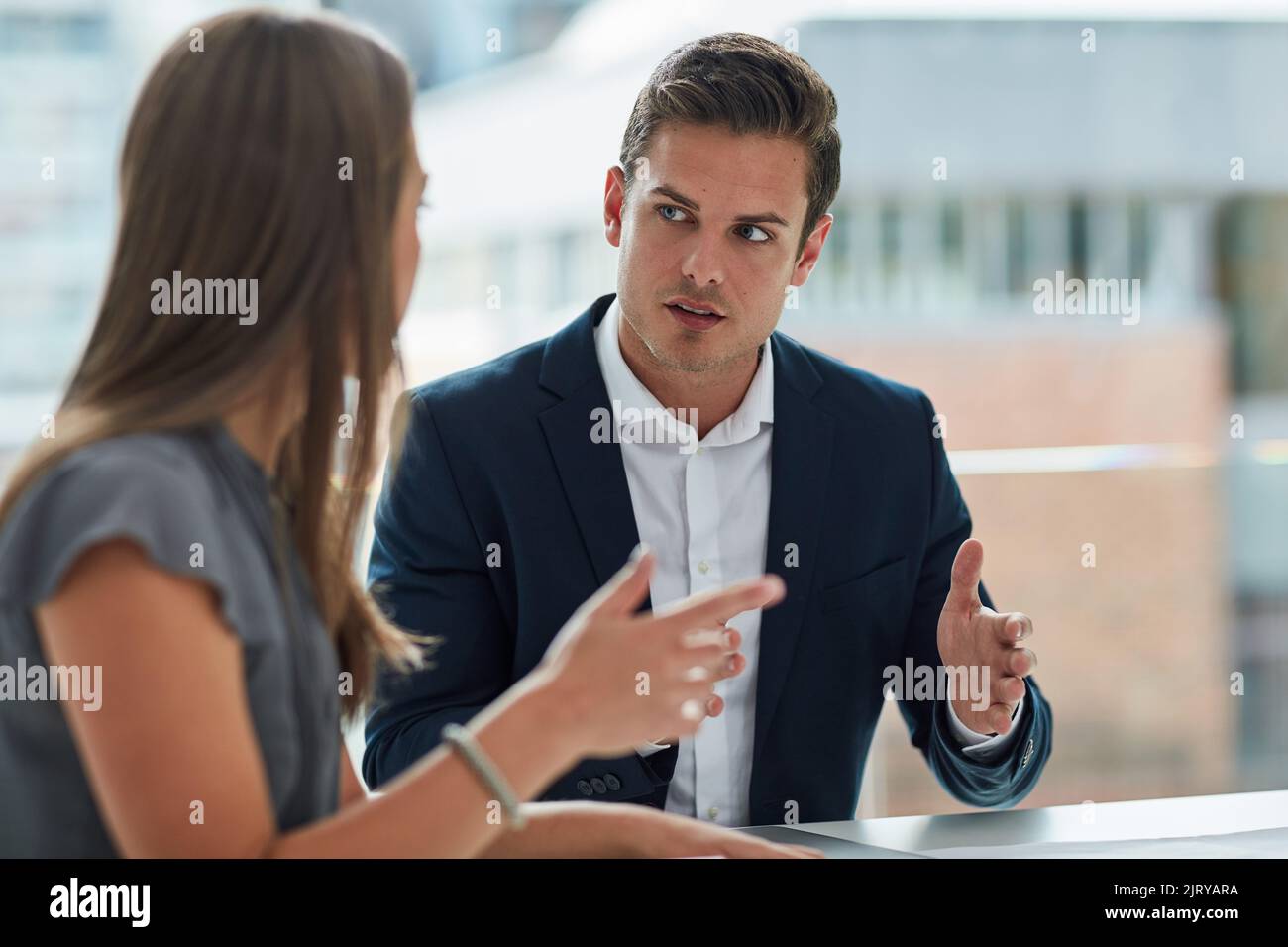 Its time for a serious conversation. two businesspeople having a