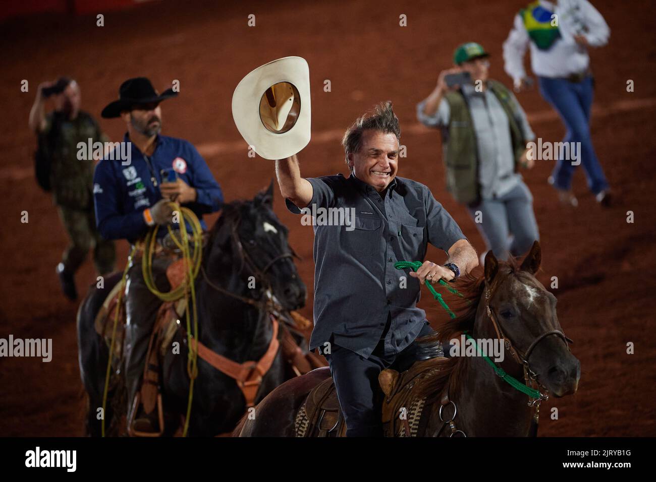 Barretos, Brazil. 26th Aug, 2022. Brazilian president and re-election candidate Jair Bolsonaro rides a horse during the opening of the 28th International Rodeo in Barretos, Sao Paulo, Brazil, on August 26, 2022. (Photo by Igor do Vale/Sipa USA) Credit: Sipa USA/Alamy Live News Stock Photo