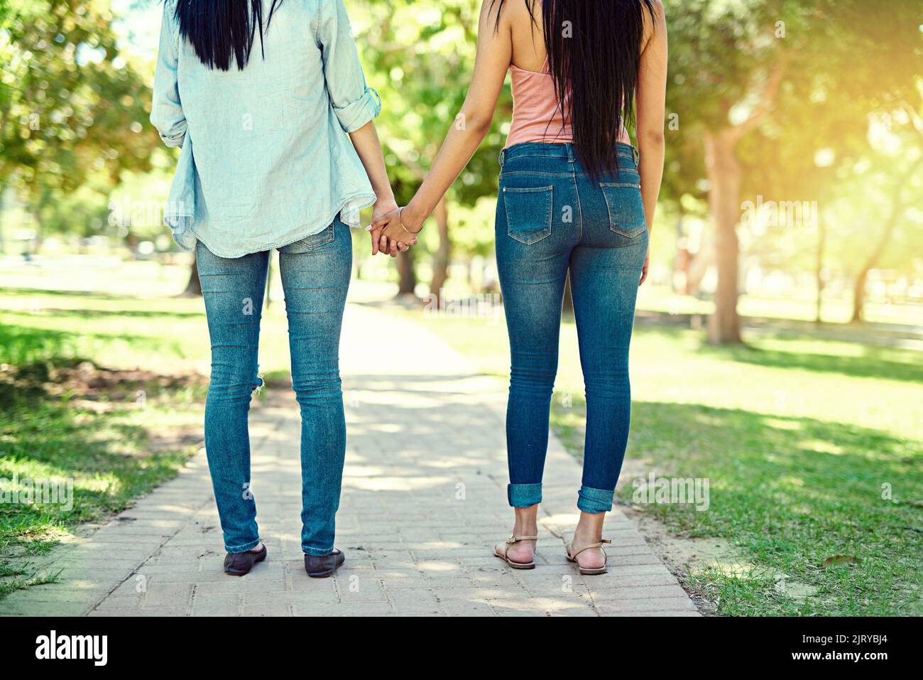 Best friends are forever. Rear view shot of two young friends holding