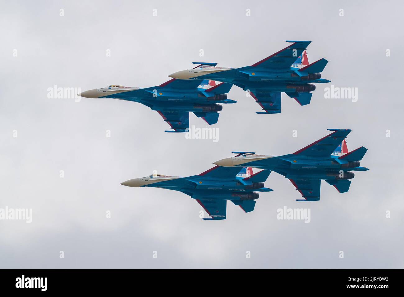 KUBINKA, RUSSIA - AUGUST 20, 2022: Four Su-35S fighters of the Russian Knights aerobatic team in flight. A fragment of the demonstration program of th Stock Photo