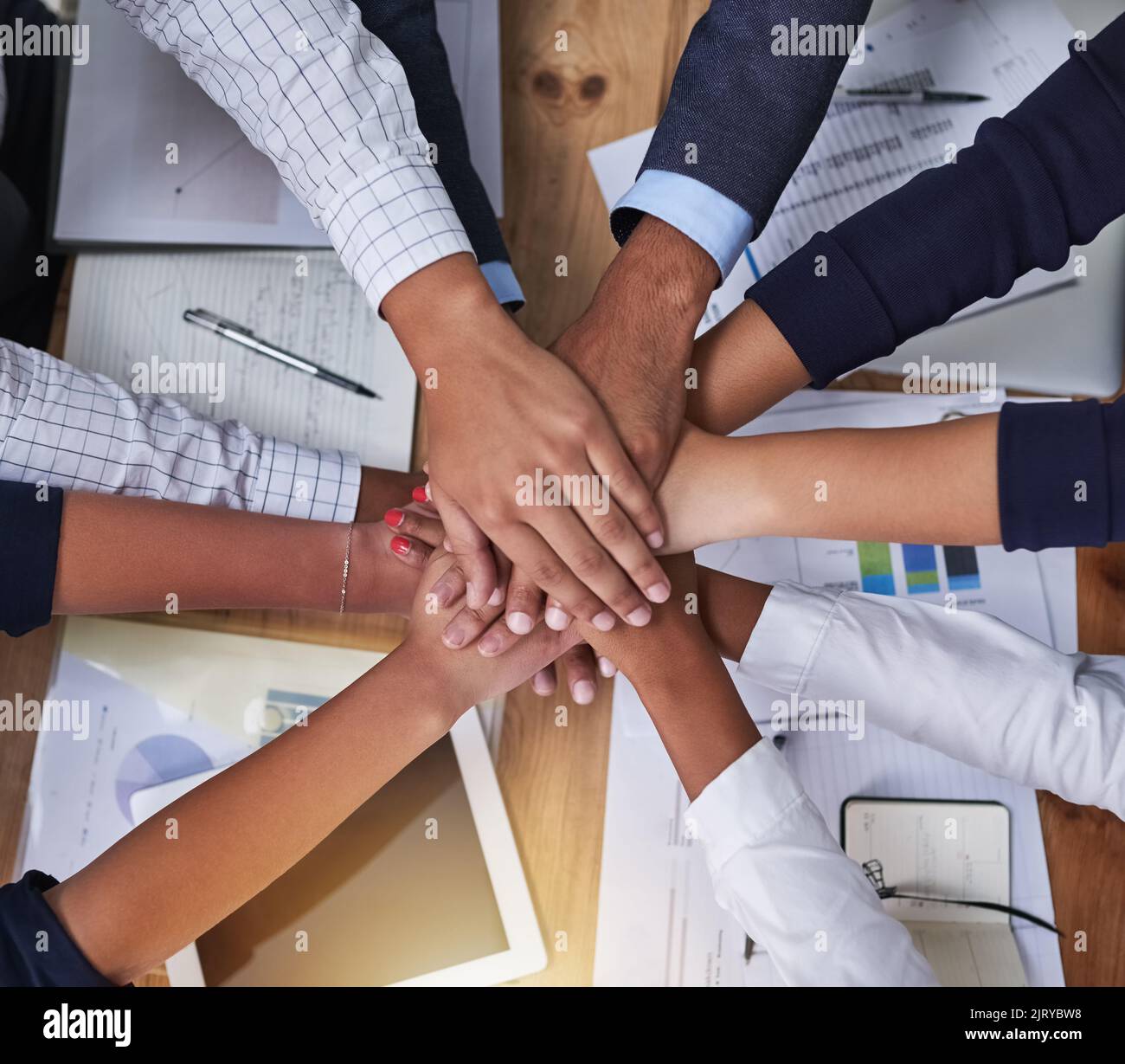 Teamwork is the key to their success. High angle shot of a group of ...