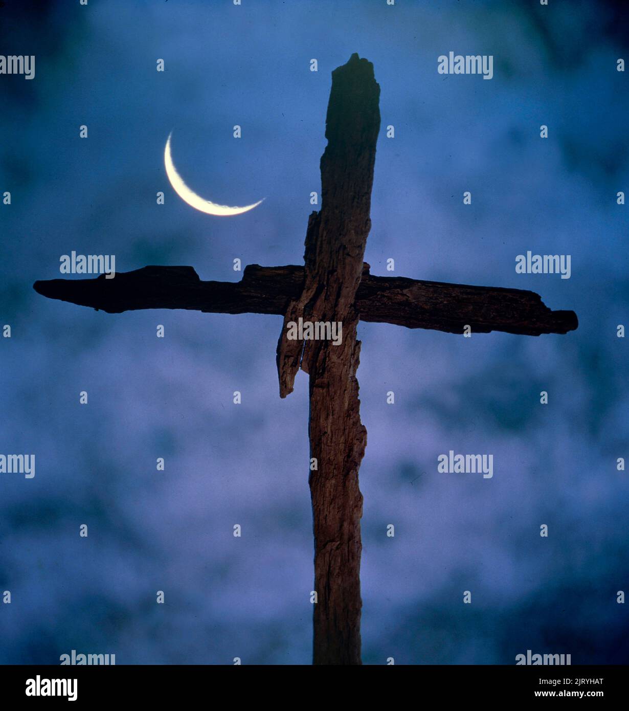 Cross with crescent moon Stock Photo Alamy