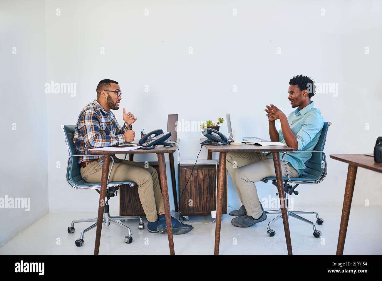 Bouncing ideas back and forth. two young coworkers having a discussion