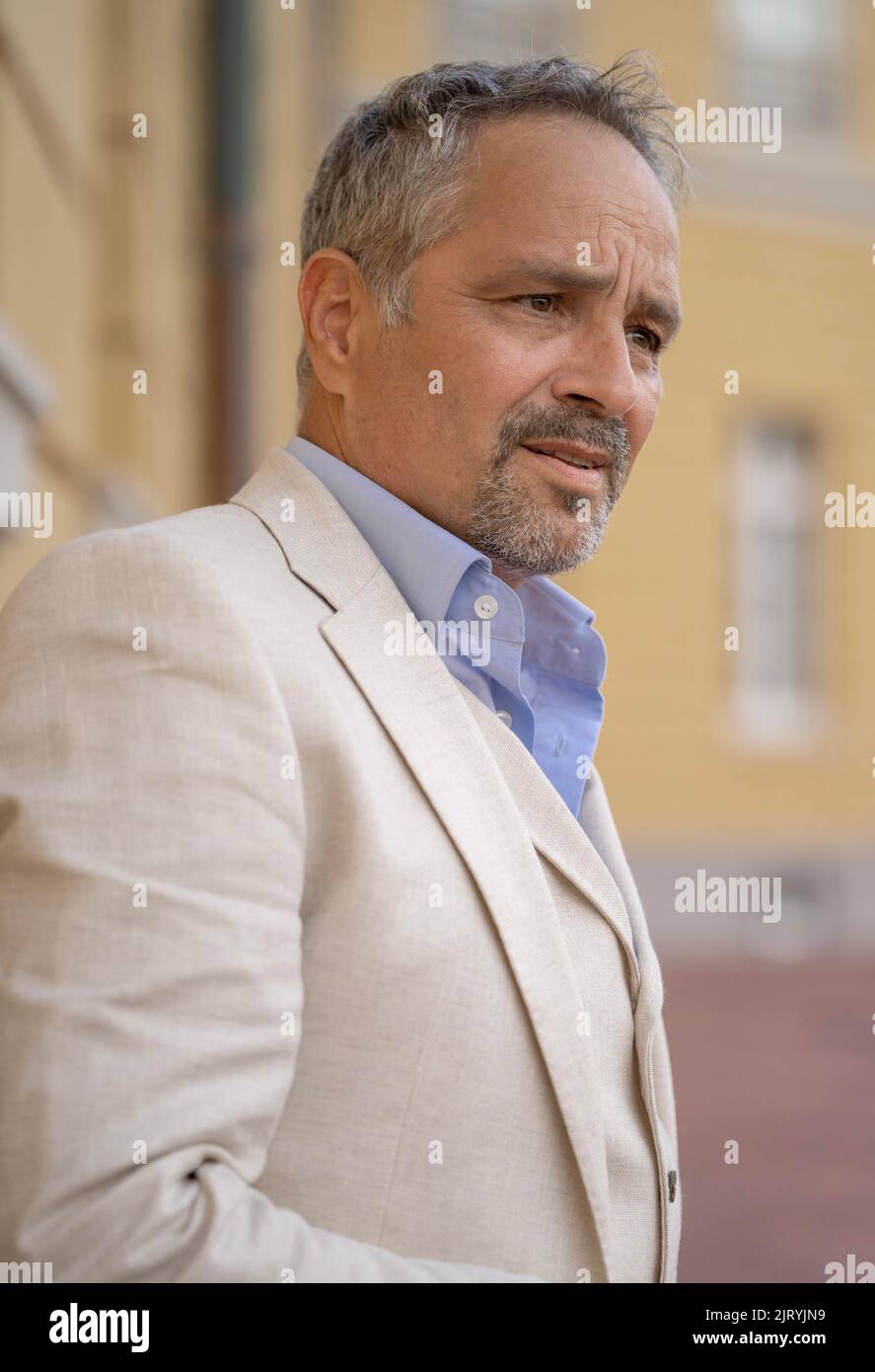 Man in suit looks confused, Karlsruhe, Germany Stock Photo