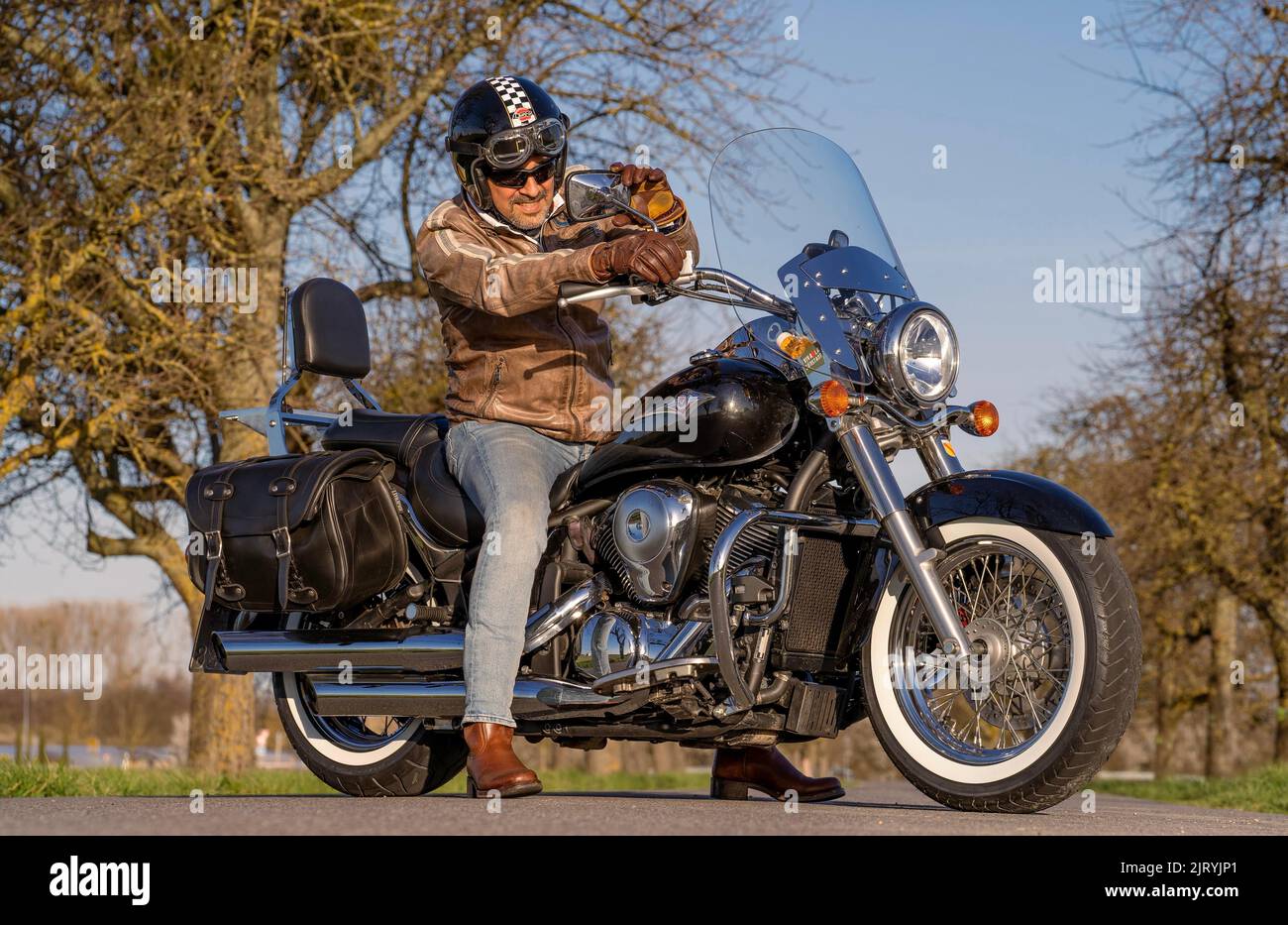Middle-aged man on motorbike, Karlsruhe, Germany Stock Photo