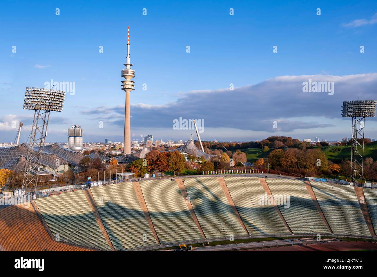 Rows of seats in the Olympic Stadium, Olympic Tower and tent roof of ...