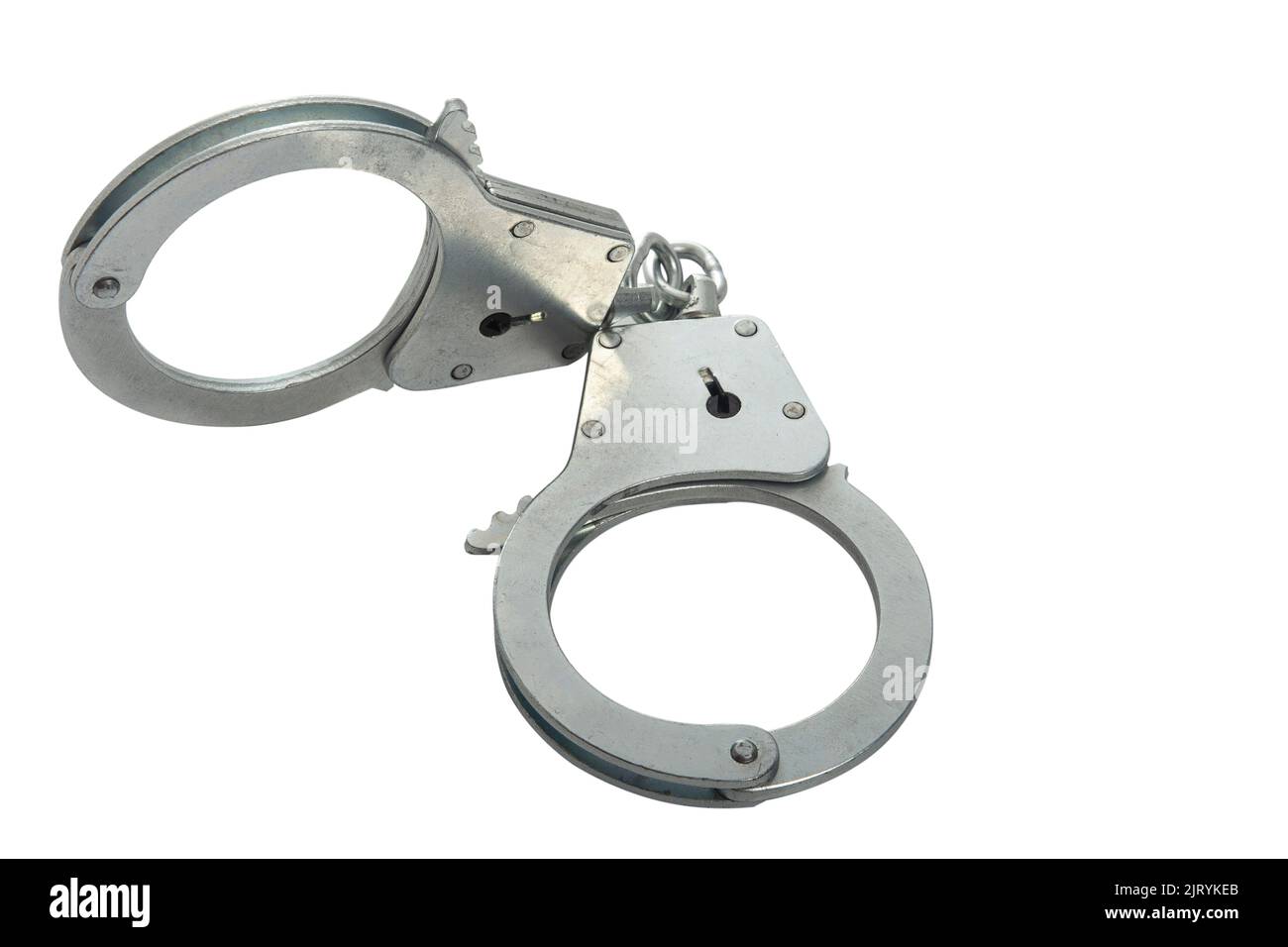 Metal handcuffs on a white isolated background, copy space Stock Photo