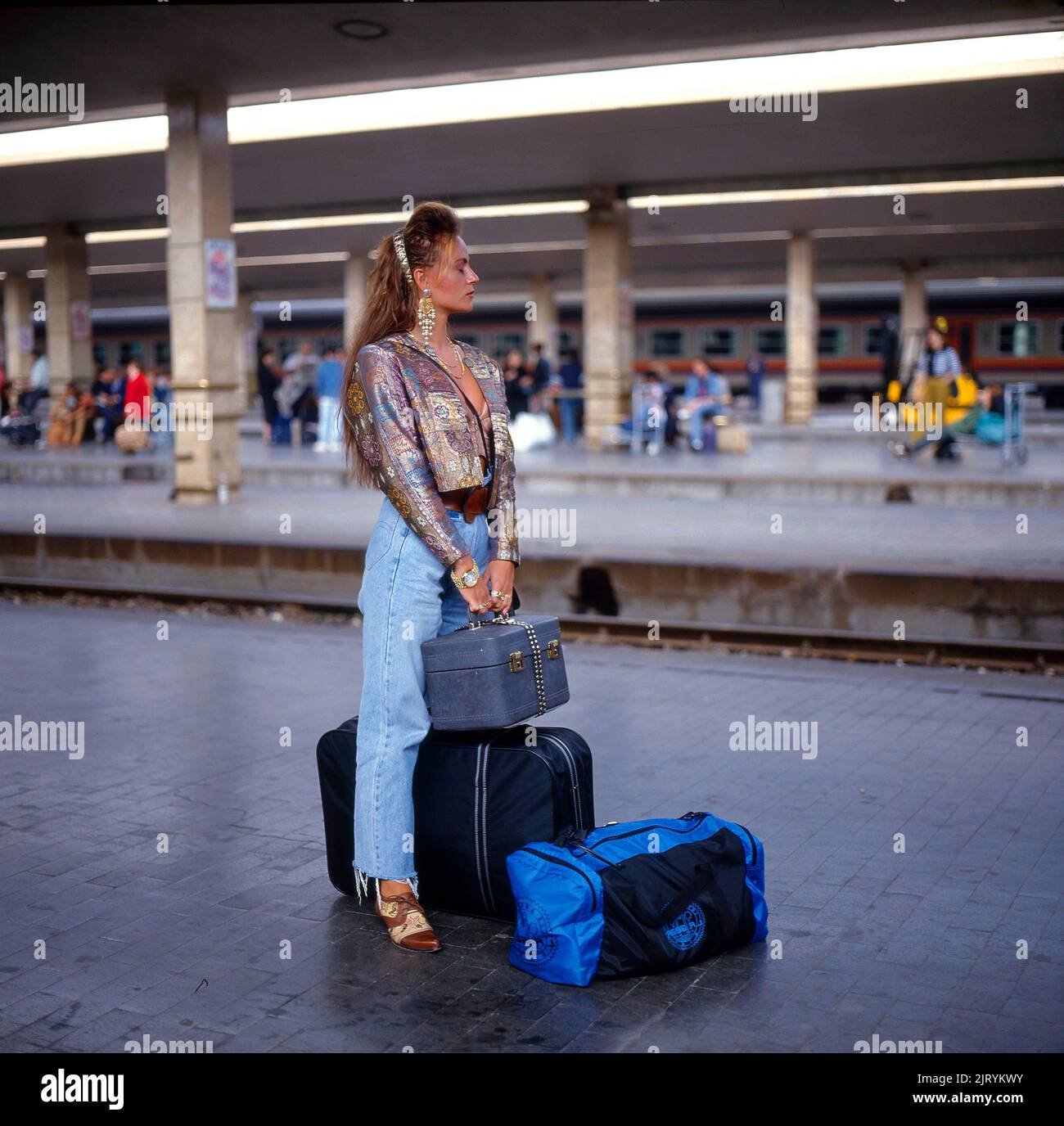 Female passenger waiting train hi-res stock photography and images - Alamy