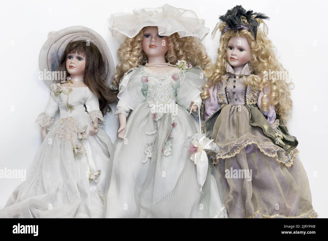 Porcelain dolls in the vintage costume Stock Photo