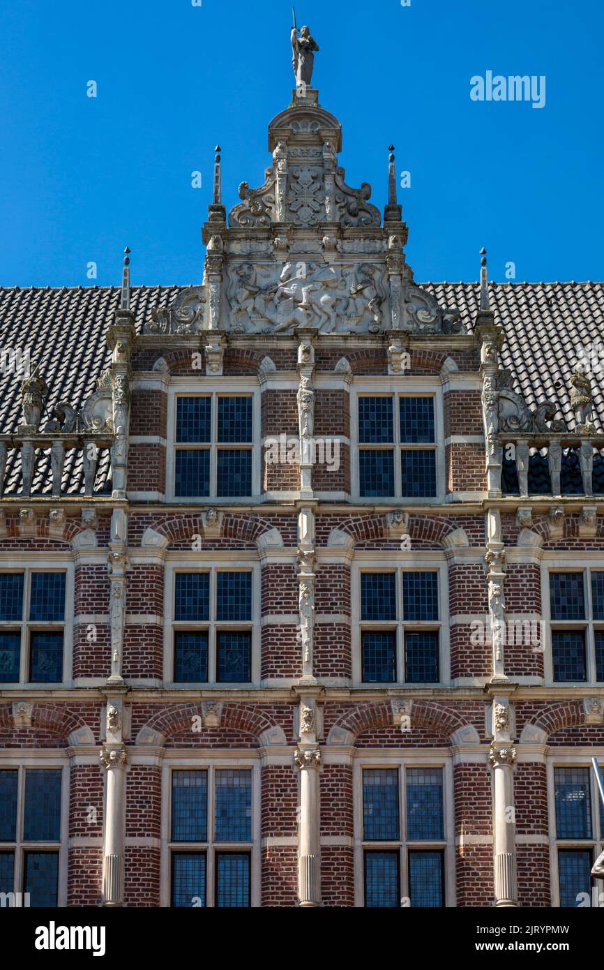 Germany, Bocholt, Lower Rhine, Westmuensterland, Muensterland, Westphalia, North Rhine-Westphalia, NRW, historical town hall Bocholt, renaissance, partial view, transverse gable with illustration of the patron saint St. George fighting with the dragon Stock Photo