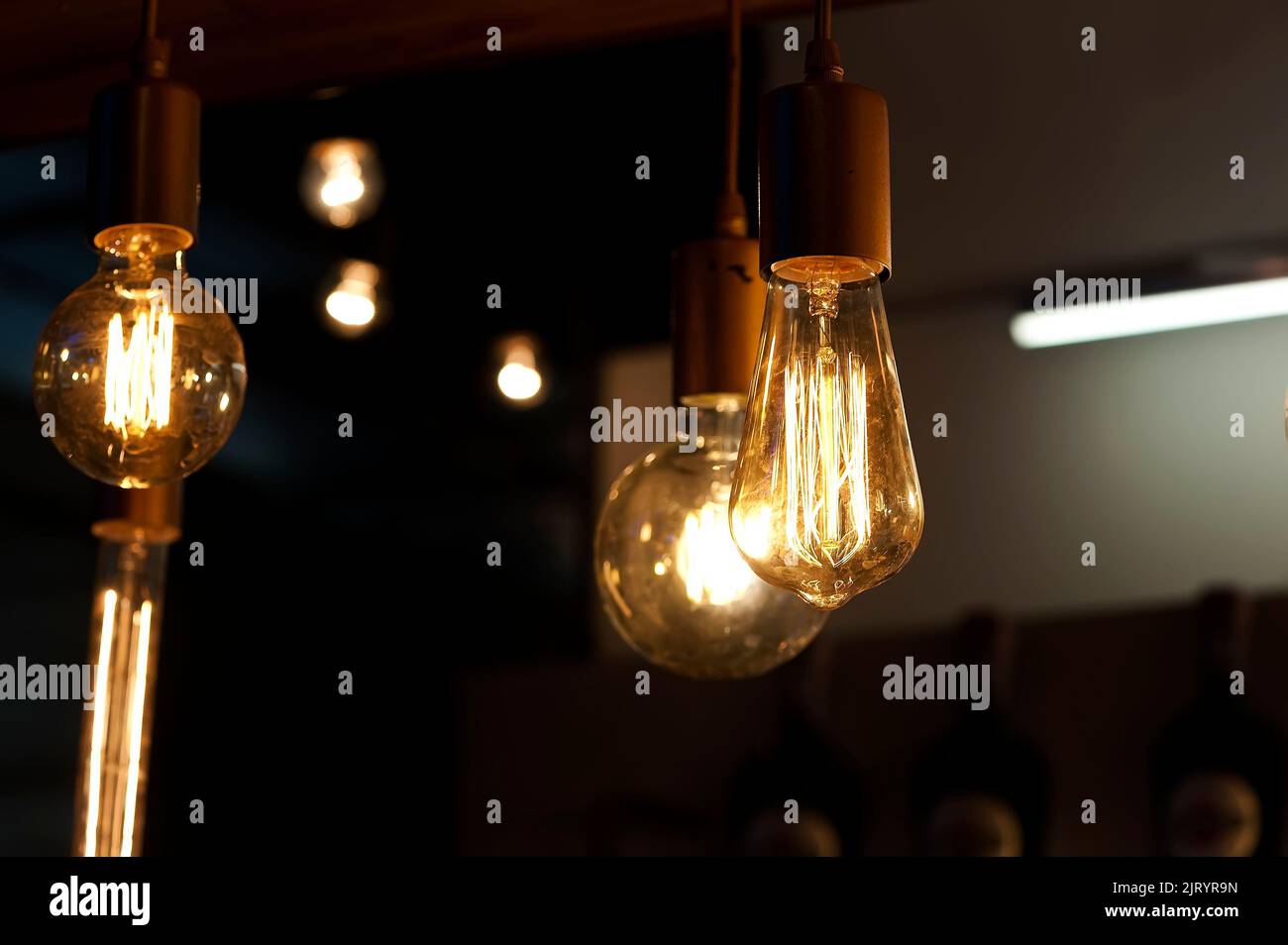 Light bulbs, lamps hanging on wires Stock Photo Alamy