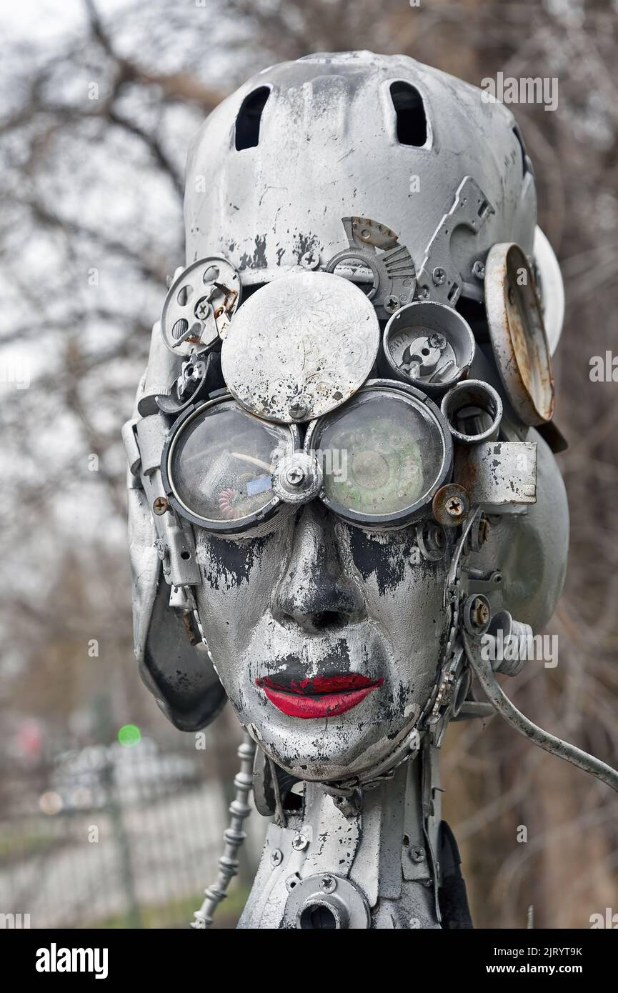 Closeup to female head of steampunk decorative statue keeping lamp in the yard of the beer restaurant Kovcheg (Ark)  in Ternopil, Ukraine Stock Photo