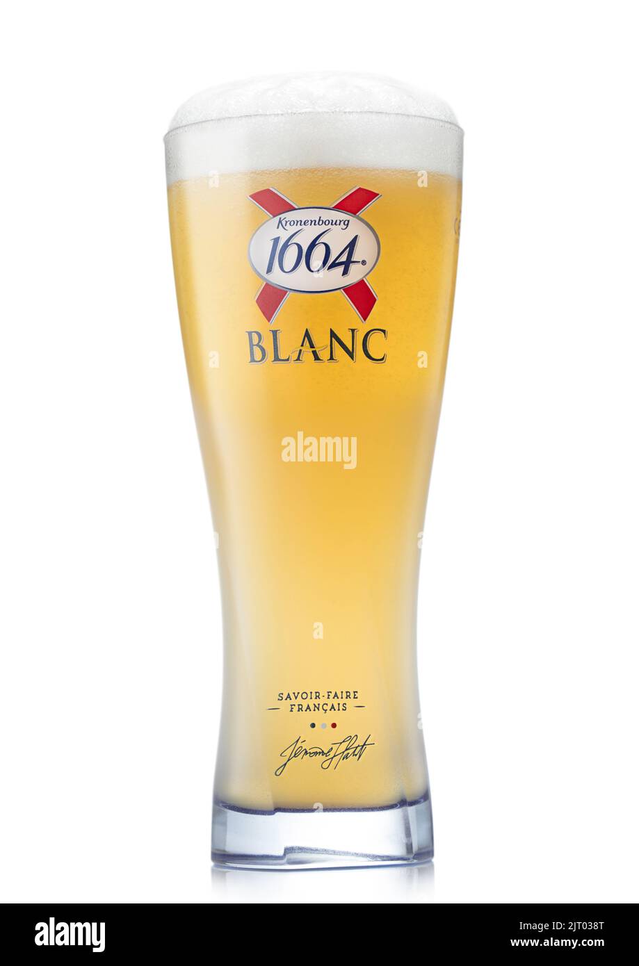 LONDON,UK - AUGUST 05,2022: Kronenbourg 1664 Blanc wheat beer in original matt glass with foam on white. Stock Photo