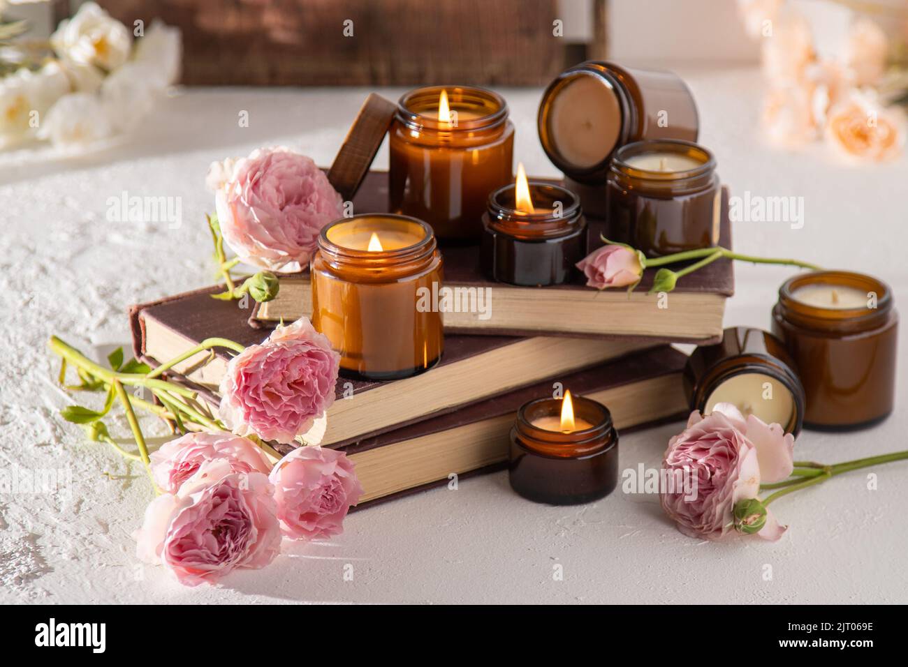 A set of different aroma candles in brown glass jars. Scented handmade ...