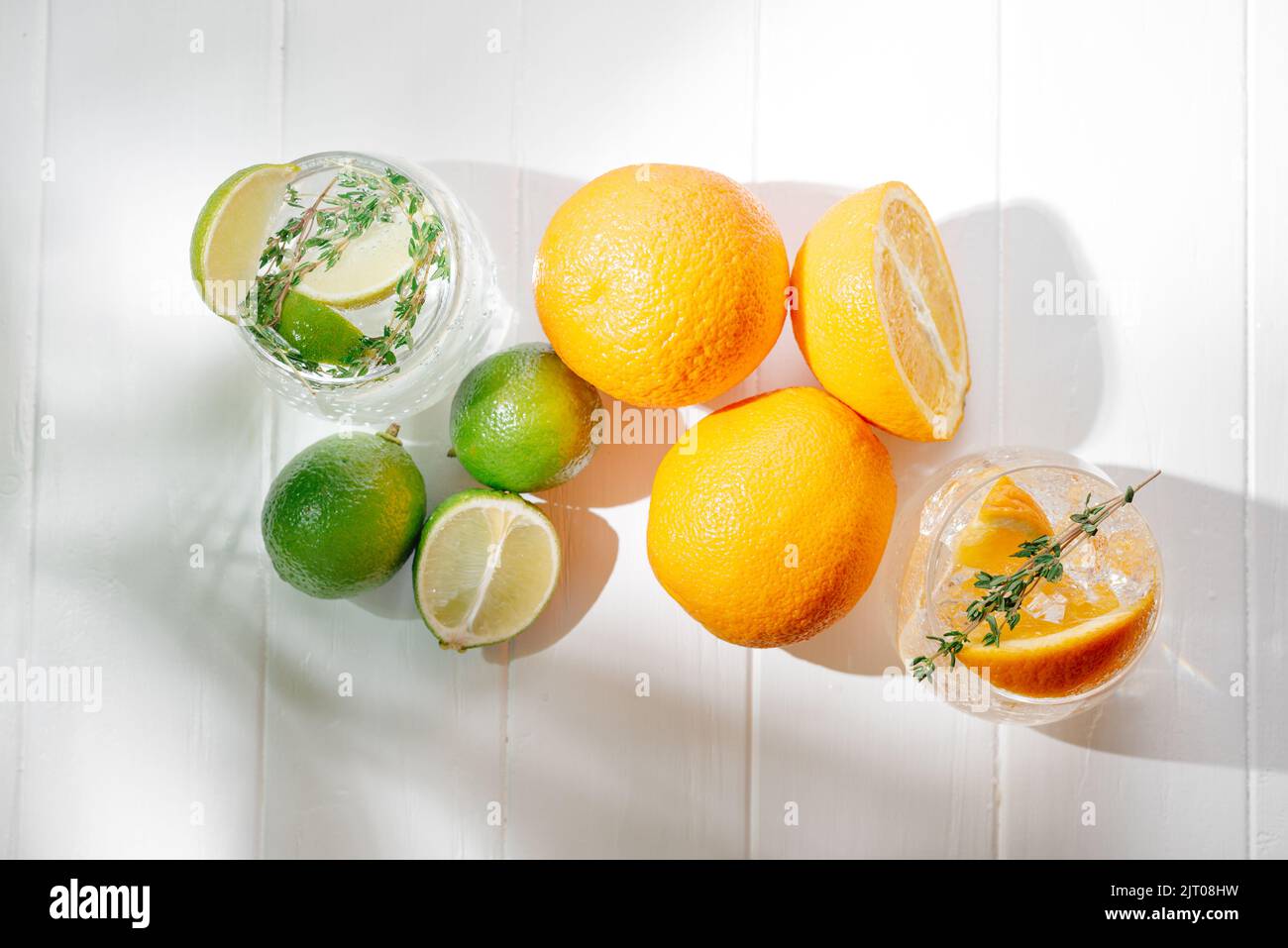 ingredients for an alcoholic beverage hard-seltzer is a low-alcohol beverage that includes alcohol, carbonated water, and fruit, berry, and plant Stock Photo