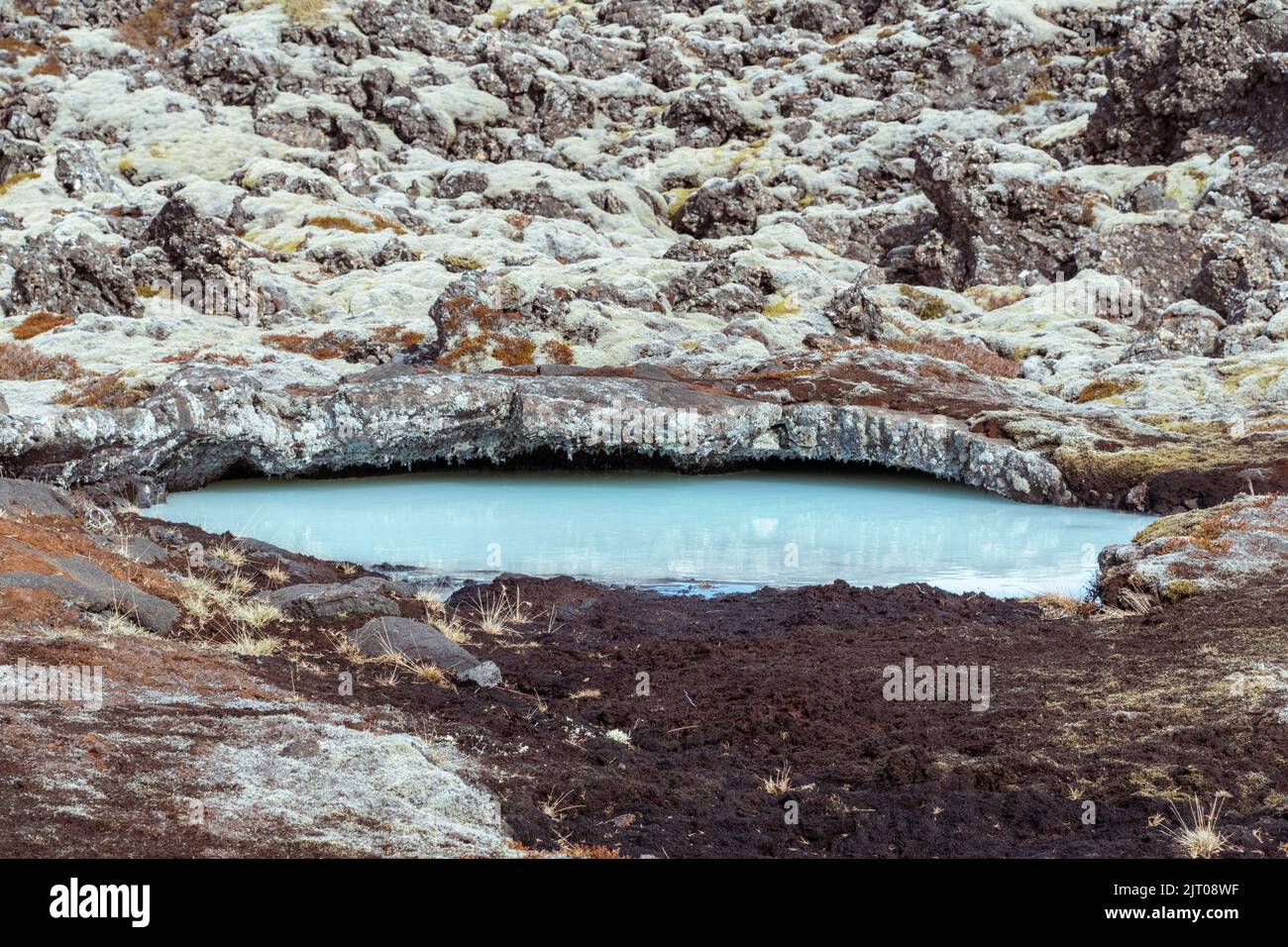 The milky blue waters from the geothermal power station that feed into