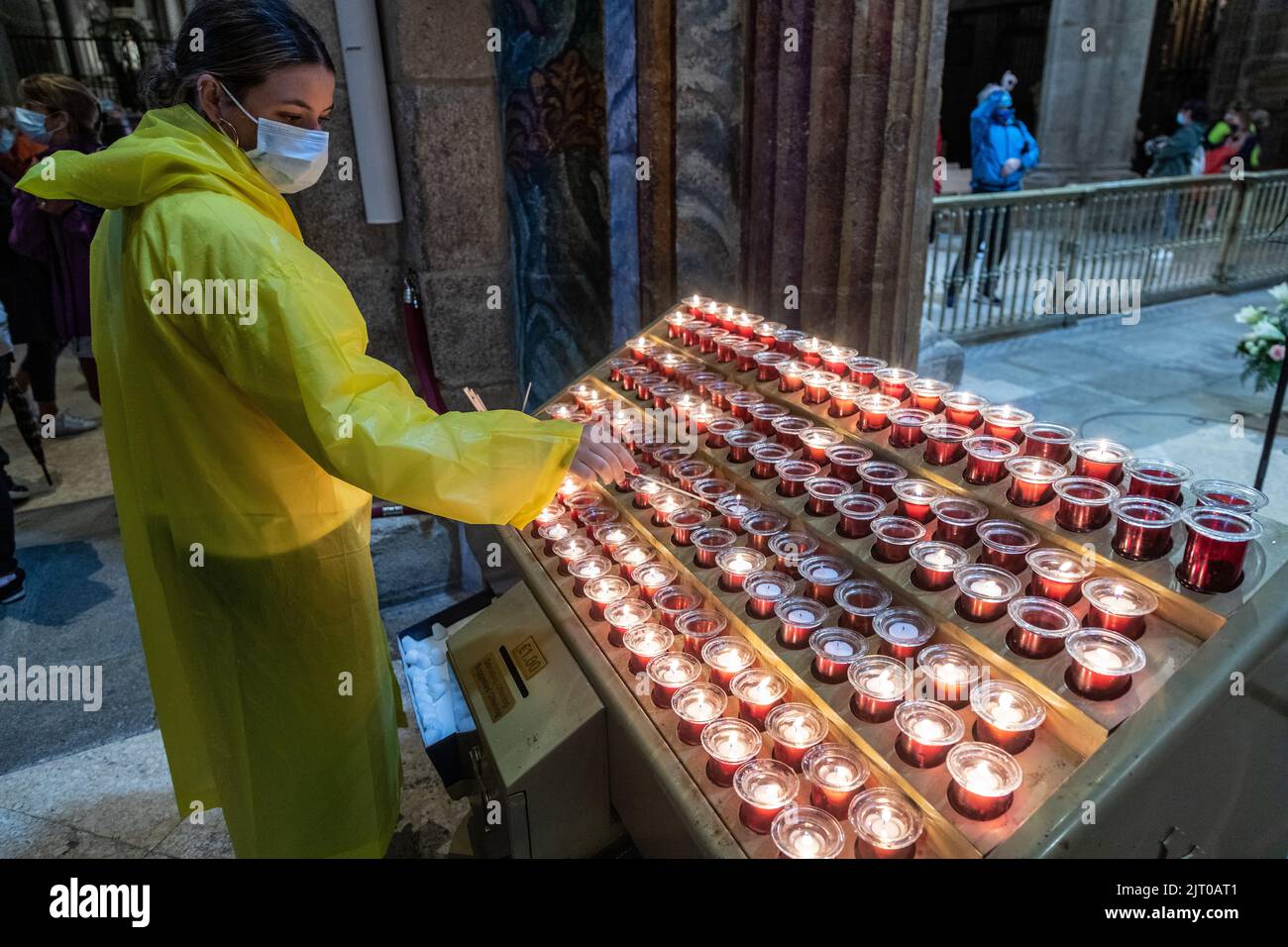 Lighting Candles in The Cathedral Of Santiago  De Compostela Stock Photo