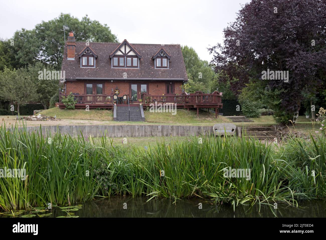 Large luxurious properties on banks of River Avon Warwickshire Stock Photo