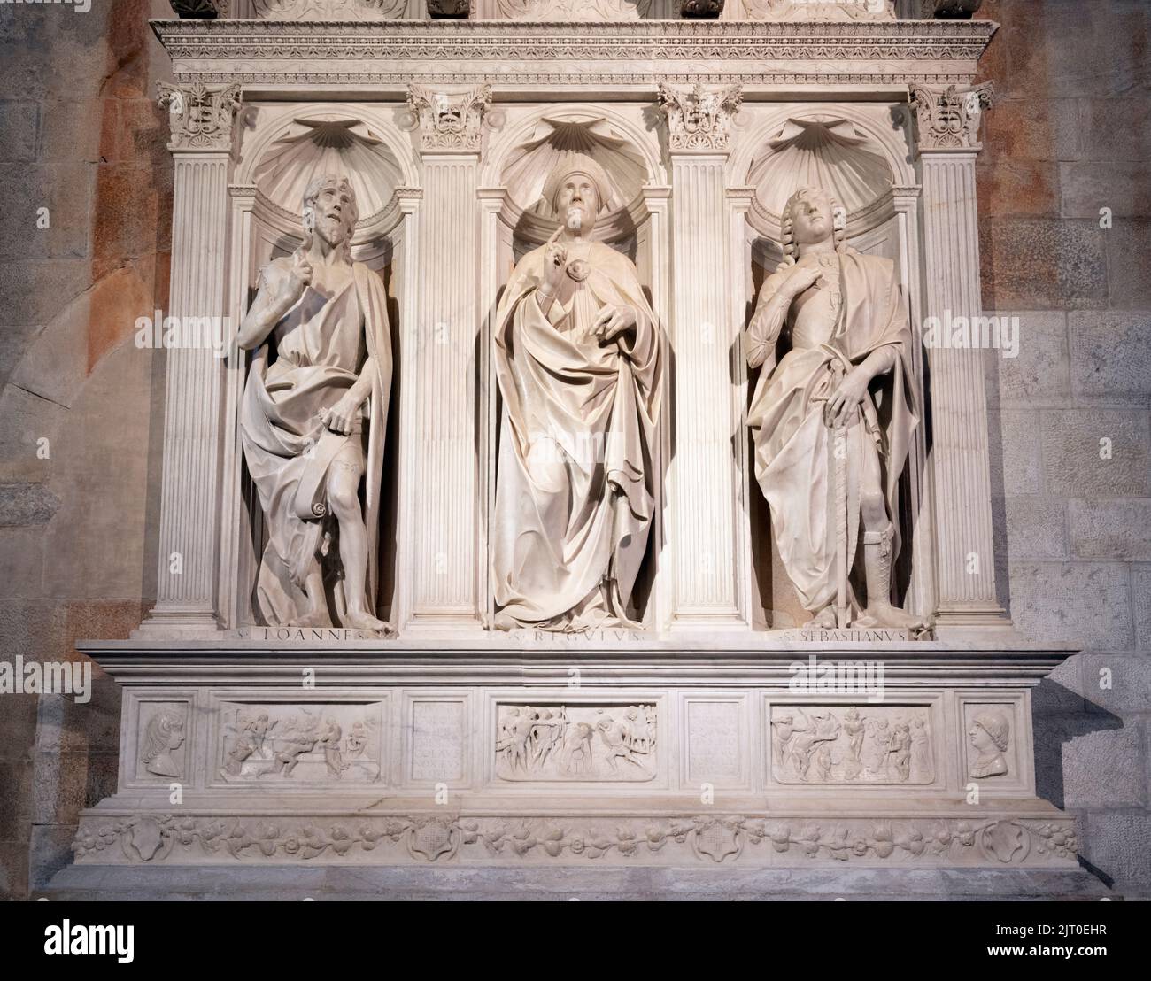 Chapel of Saint Regolo showing Saint Regolo centre, St. John the Baptist left and Saint Sebastian right.  It is the work of Italian sculptor Matteo Ci Stock Photo