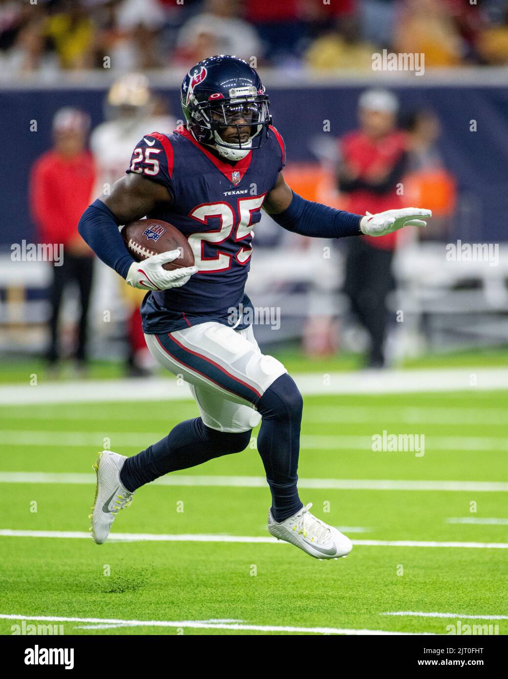Houston Texans cornerback Desmond King II (25) runs after intercepting