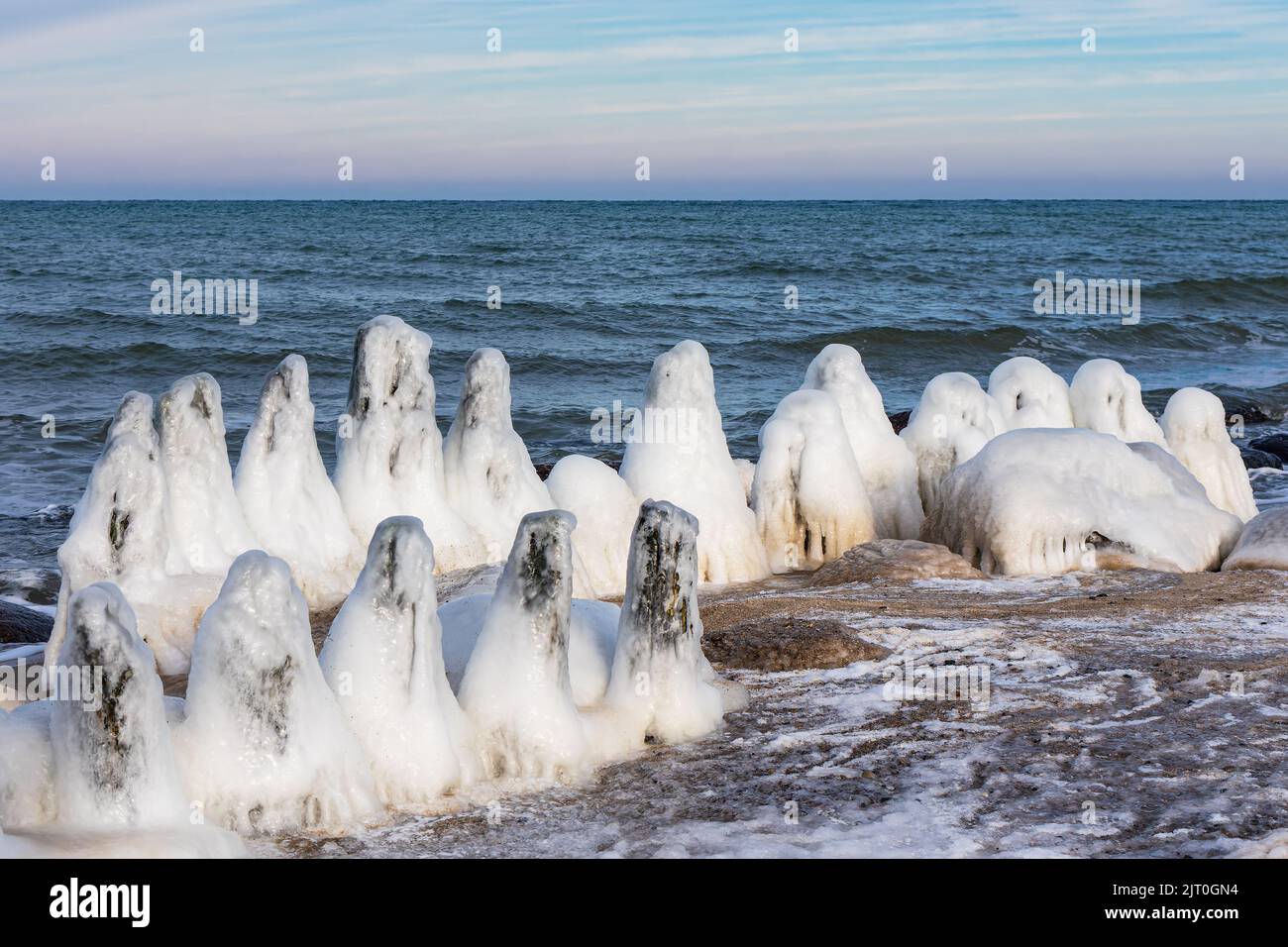 Groyne in wintertime on the Baltic Sea coast near Kuehlungsborn, Germany. Stock Photo