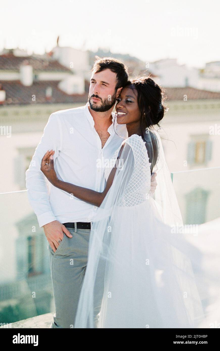 African bride groom hugging hi-res stock photography and images - Alamy