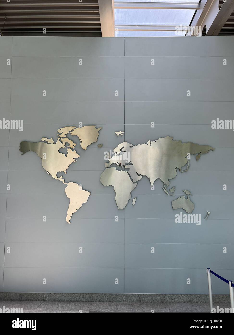 World map image at the airport on the wall. High quality photo Stock Photo