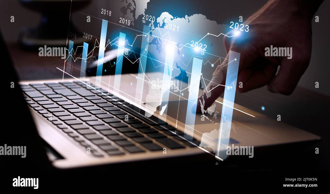 business smart interface trading on laptop background. mixed media banner Stock Photo