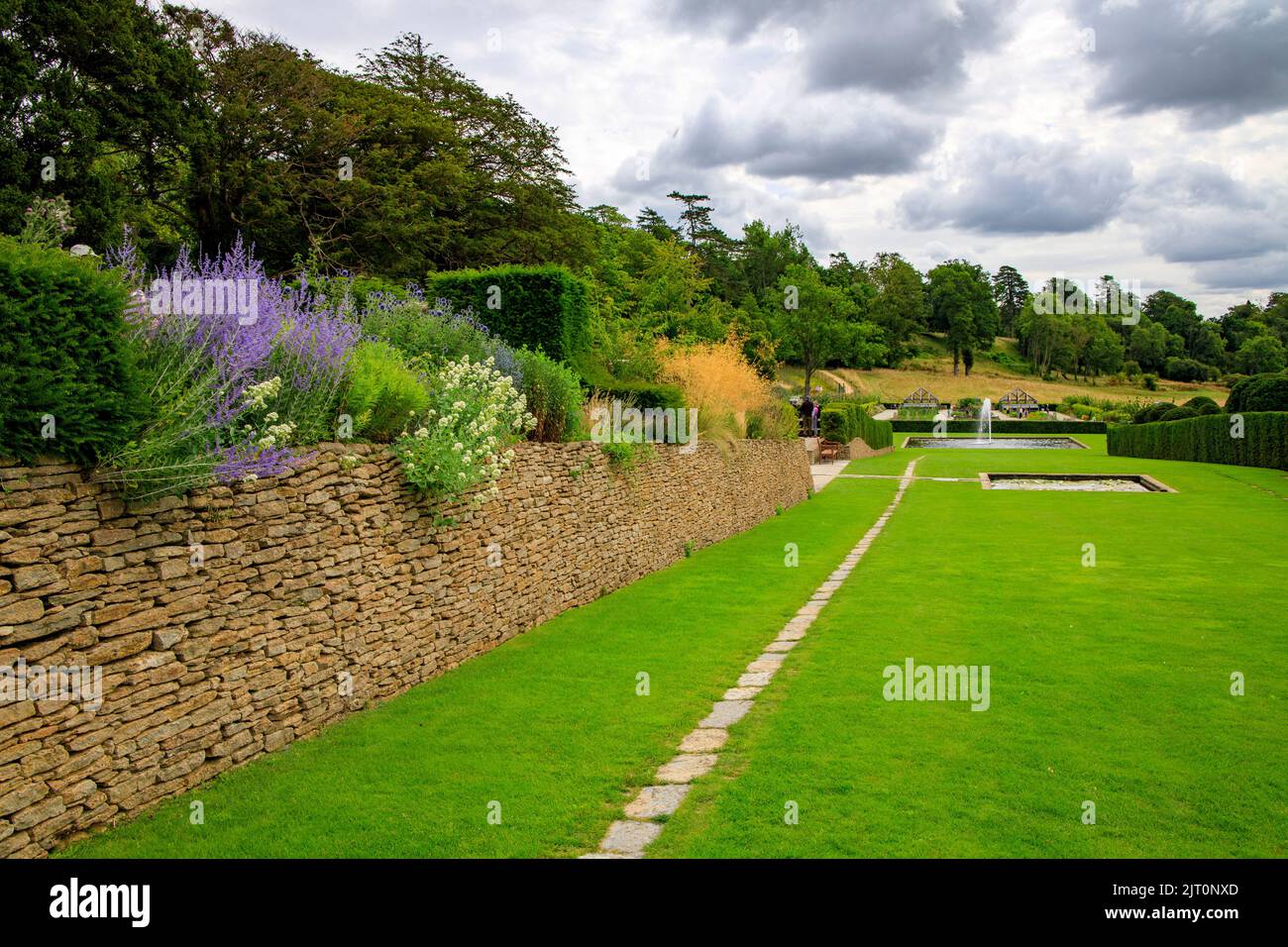 The Long Walk with its water lily pond in the newly restored 'The Newt in Somerset' garden and hotel, nr Bruton, England, UK Stock Photo