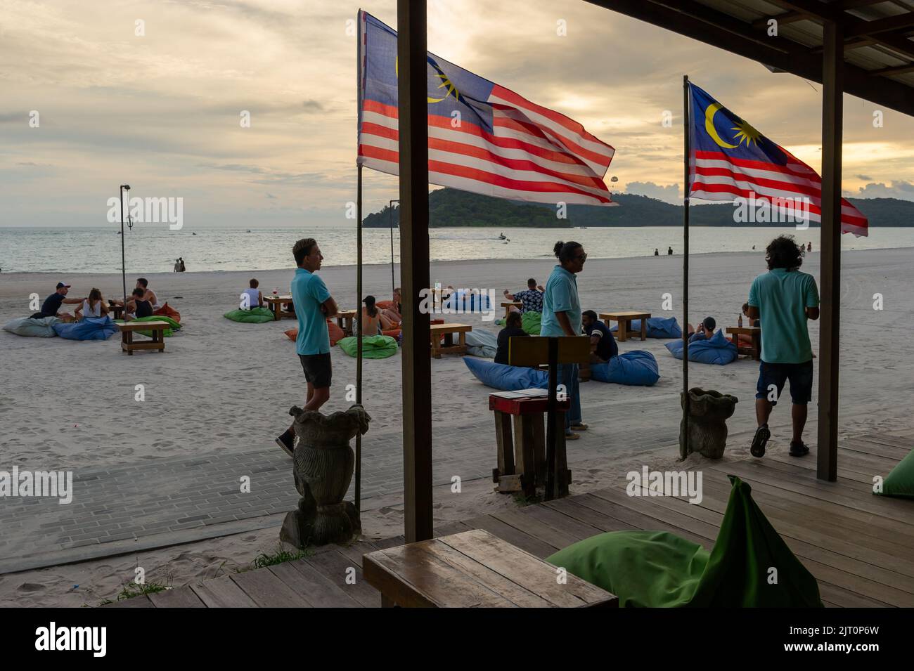 Beach Bar on Chenang Beach at sunset, Langkawi, Malaysia Stock Photo