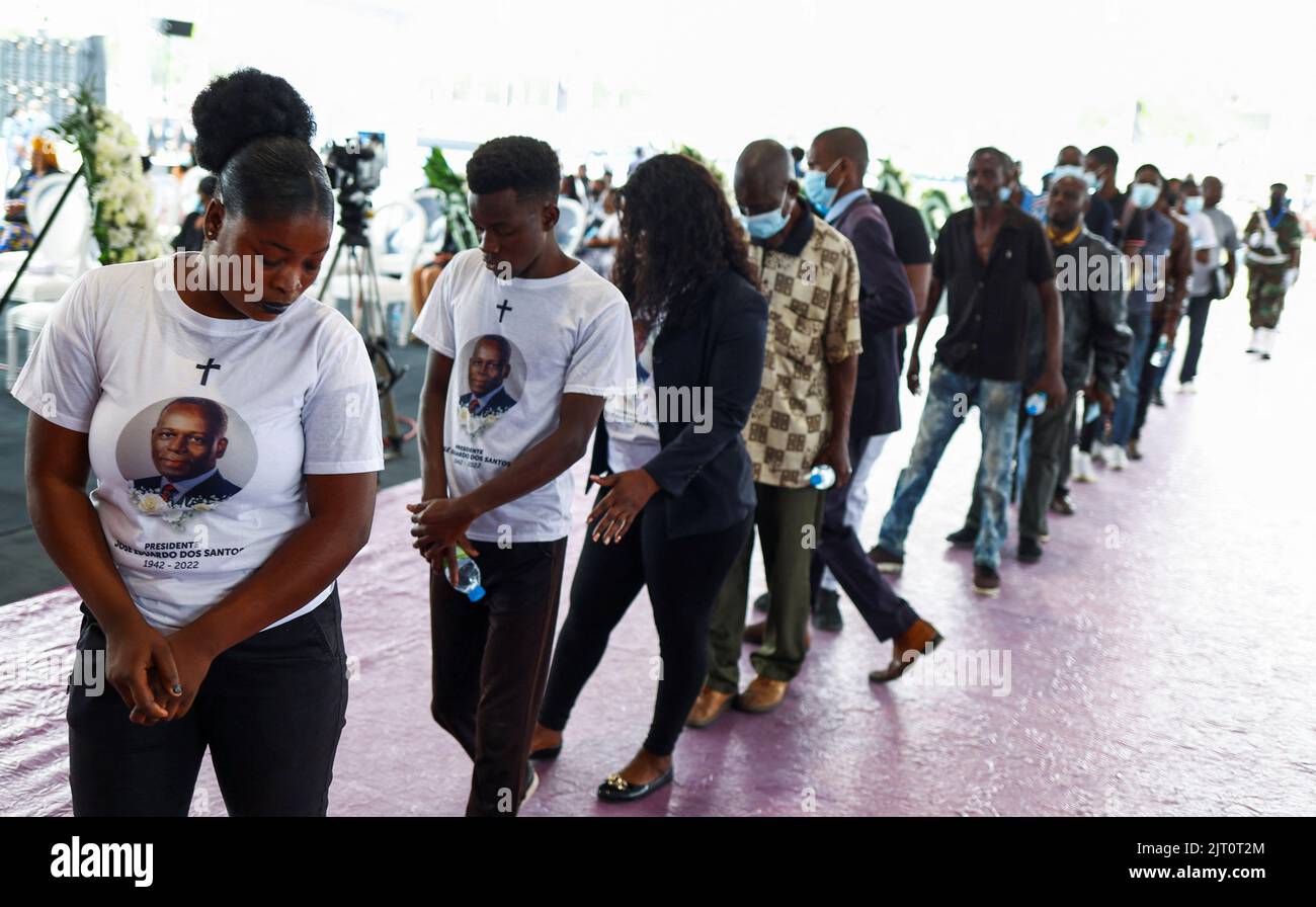Angolans line up to pay their respect by a casket carrying the body of Angola's former President Jose Eduardo dos Santos, who died in Spain in July, at the Agostinho Neto Memorial, during his memorial service in Luanda, Angola, August 27, 2022. REUTERS/Siphiwe Sibeko Stock Photo