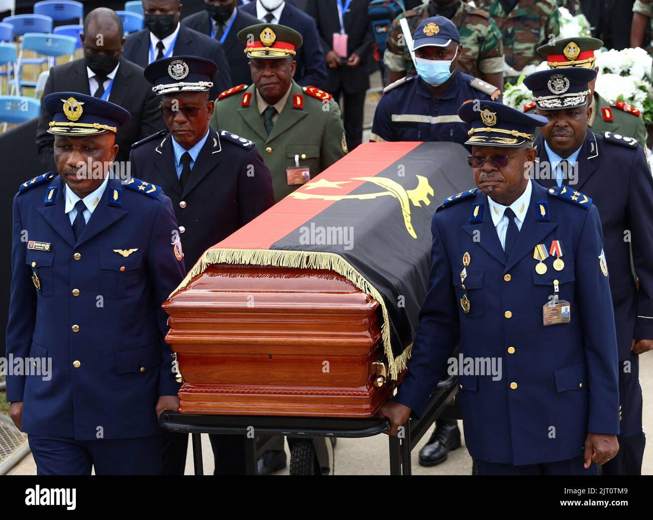 A casket carrying the body of Angola's former President Jose Eduardo dos Santos, who died in Spain in July, arrives at the Agostinho Neto Memorial, during his memorial service in Luanda, Angola, August 27, 2022. REUTERS/Siphiwe Sibeko Stock Photo