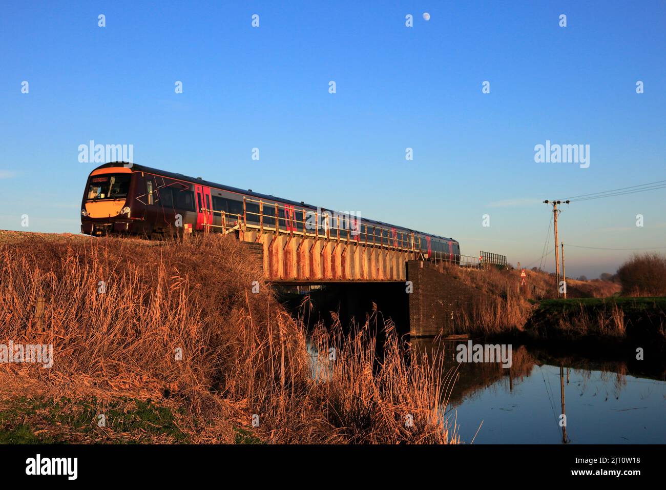 170622 C2C train near Whittlesey town, Fenland, Cambridgeshire, England Stock Photo