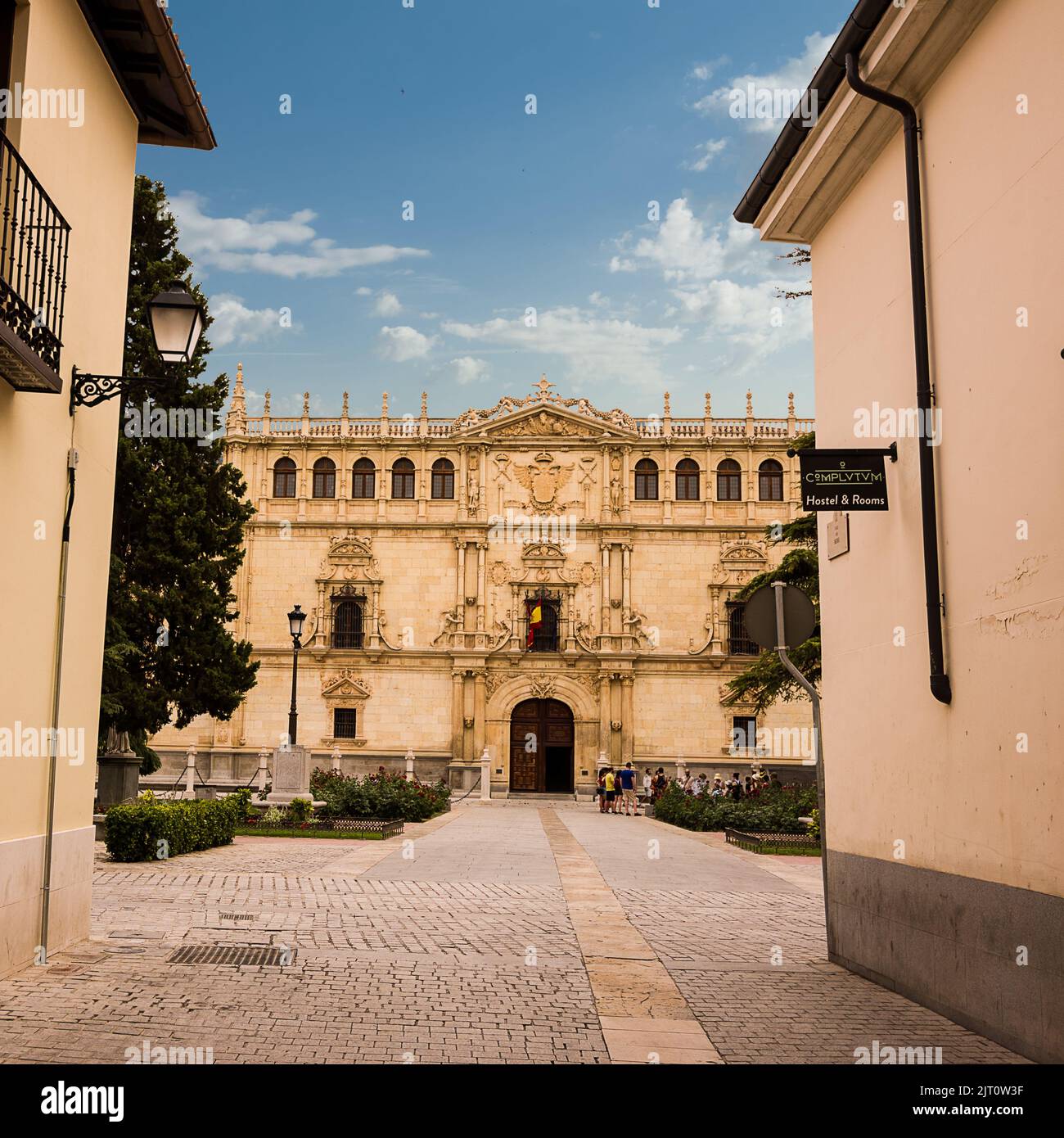 Alcalá de Henares, Spain - June 18, 2022: Facade of the building of the College of Saint Ildefonso, seat of the University of Alcalá de Henares Stock Photo