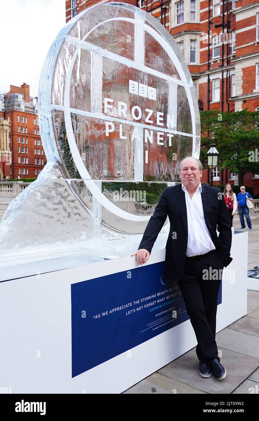EDITORIAL USE ONLY Composer, Hans Zimmer alongside 12 ice sculptures of
