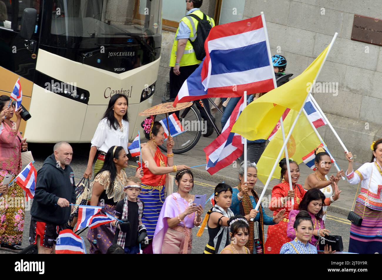 ABERDEEN, SCOTLAND - 27 AUGUST 2022: The city's Thai community in the Celebrate Aberdeen parade on Union Street. Stock Photo