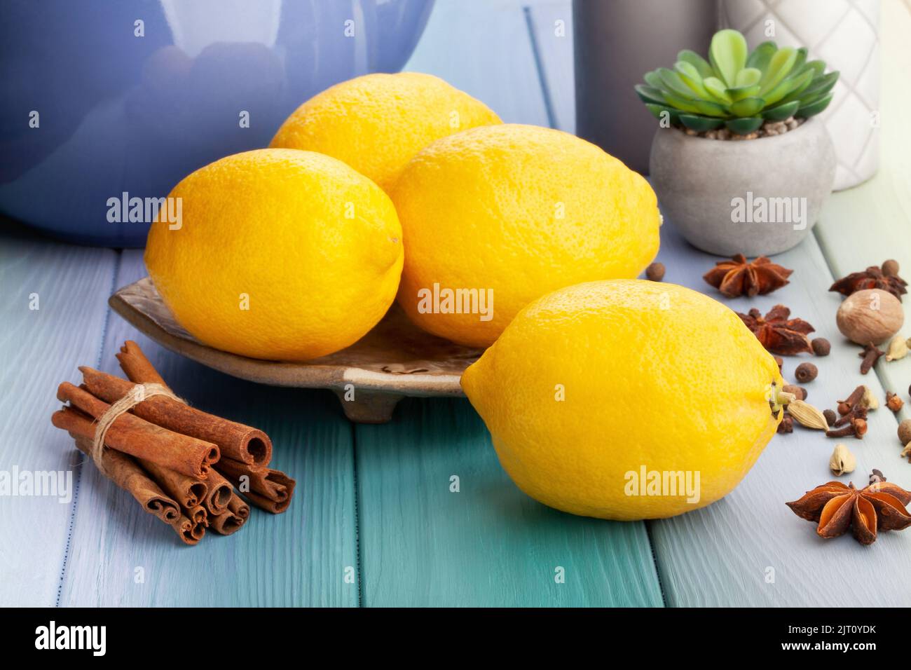 lemon on a plate on wood background Stock Photo