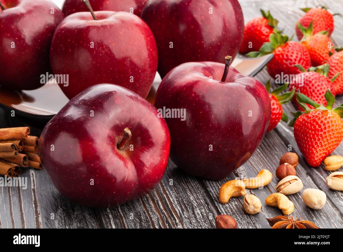 red delicious apple on wood background Stock Photo