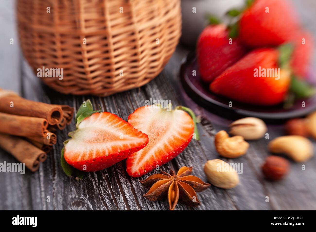 sliced strawberry on wood background Stock Photo