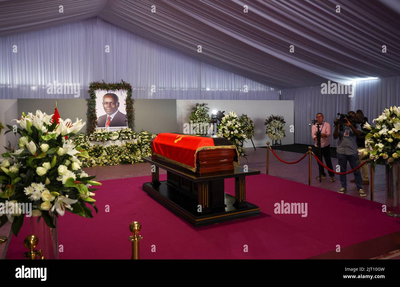 A casket carrying the body of Angola's former President Jose Eduardo dos Santos, who died in Spain in July, lies at the Agostinho Neto Memorial in Luanda, August 27, 2022. REUTERS/Siphiwe Sibeko Stock Photo