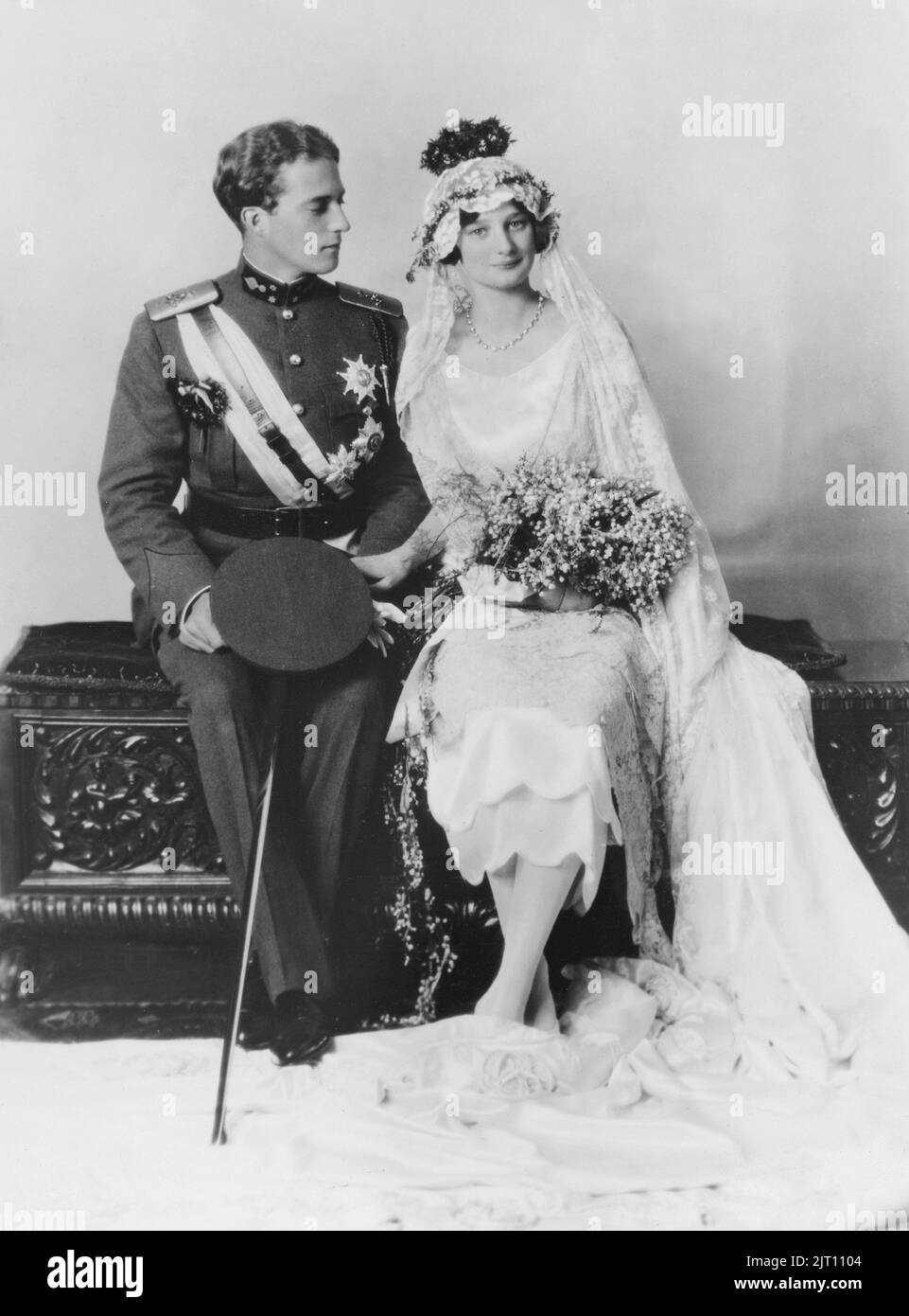 Princess Astrid of Sweden. 17 november 1905 - 29 august 1935. She was Queen of Belgium and the first wife of King Leopold III. Originally a princess of Sweden of the house of Bernadotte. During a car ride on august 29 1935 she was killed. Pictured here after their wedding 1926. She has a beautiful wedding dress and flowers in her lap with Leopold besider her in uniform. Stock Photo