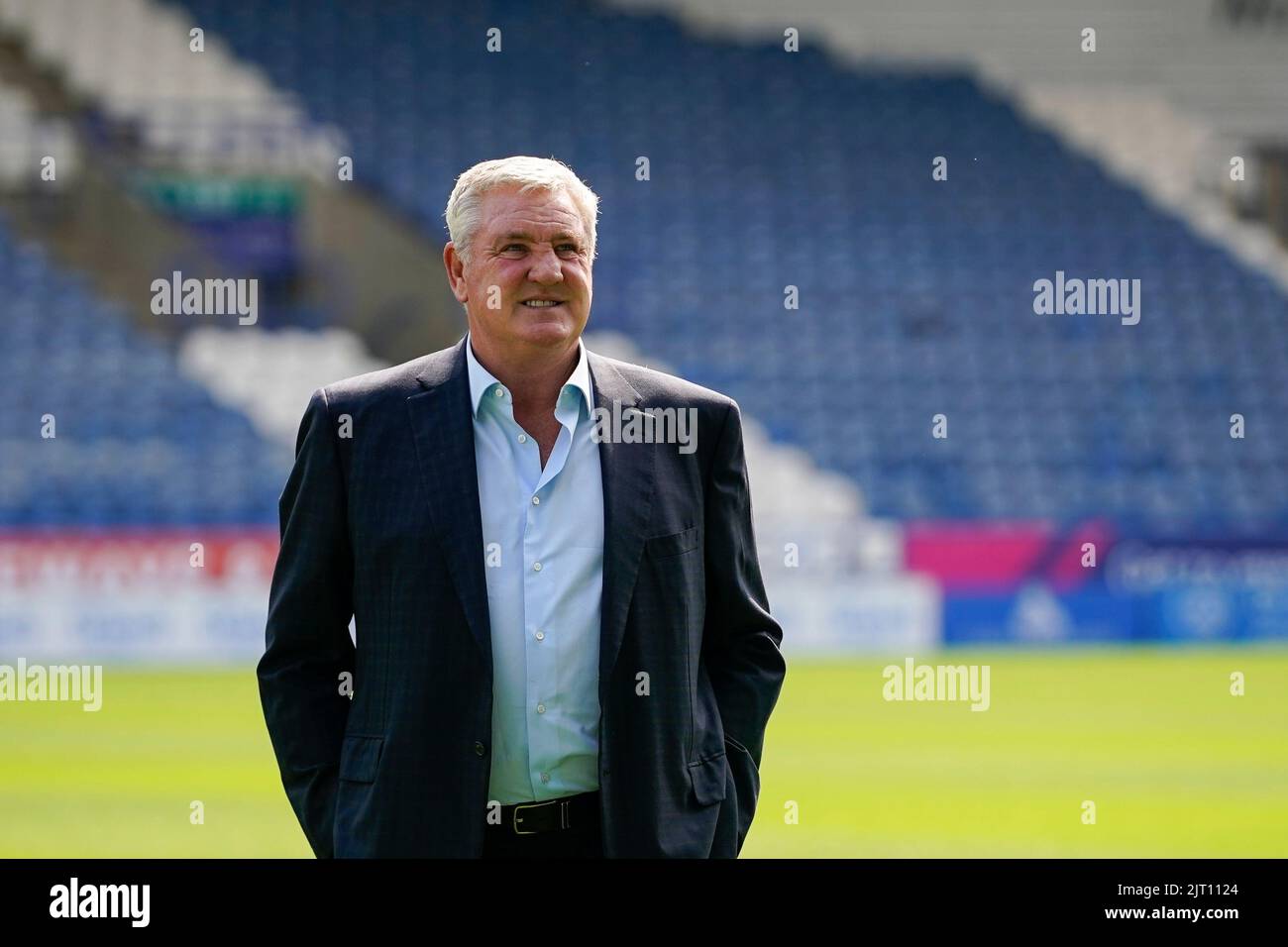 Steve Bruce manager of West Bromwich Albion inspects the pitch before