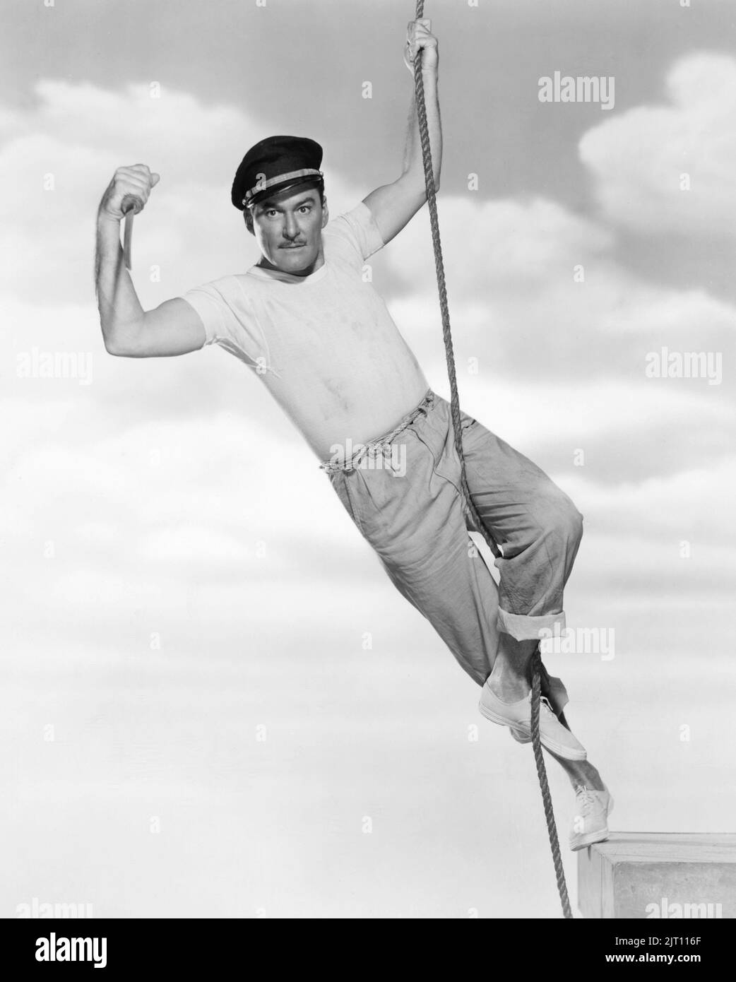 Errol Flynn. Australian-American actor. 20 june 1909 - 14 october 1959. He achieved wordwide fame during the Golden age of Hollywood, known for his romantic swashbuckler roles. Pictured when starring in the 1951 movie Adventures of captain Fabian. Stock Photo