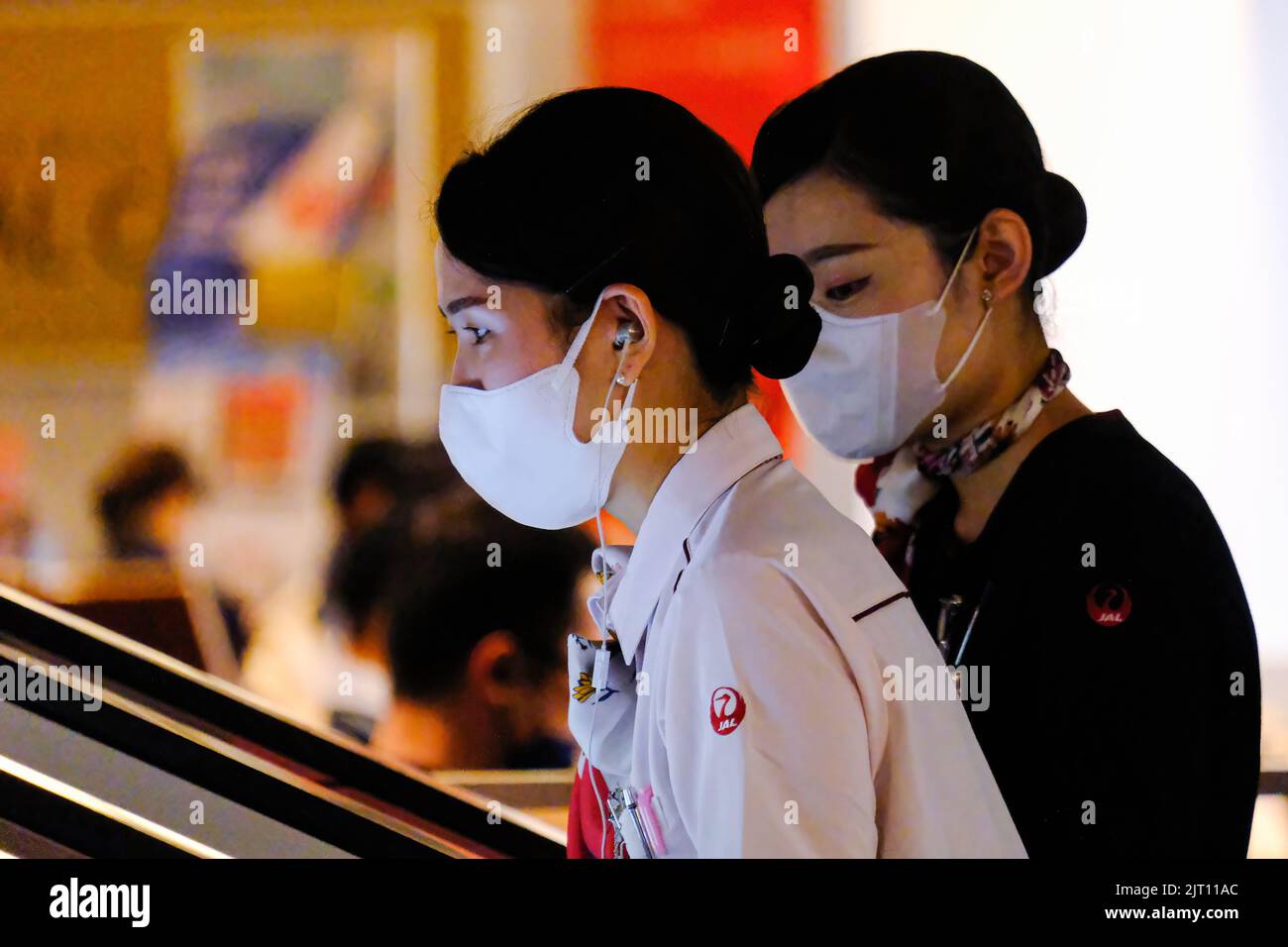 Employees of Japan Airlines (JAL) wearing face masks as a preventive