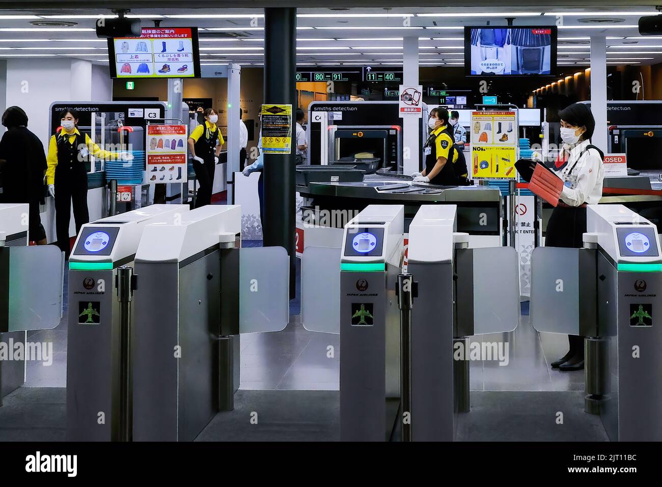 Employees of Japan Airlines (JAL) wearing face masks as a preventive