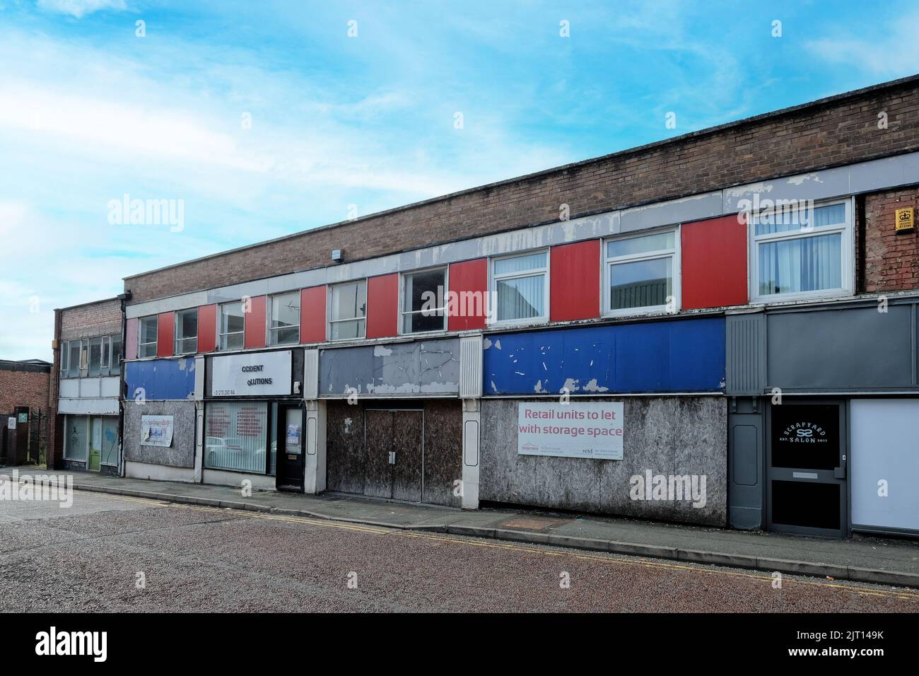 Derelict retail units in the High Street of Crewe Cheshire UK Stock Photo