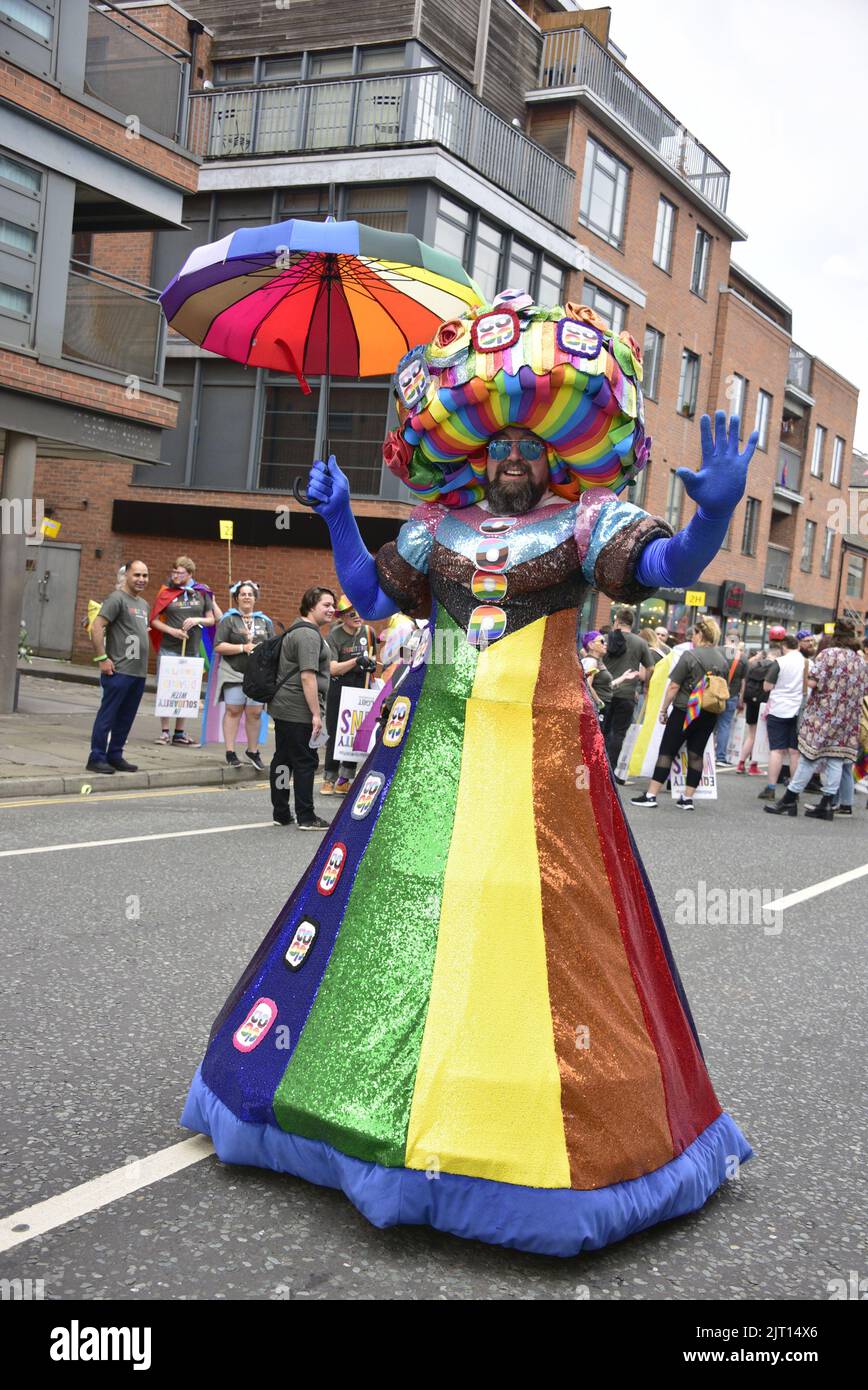 Manchester, UK. 27th August, 2022. Participants get ready to take part in the LGBTQ+ Pride parade, central Manchester, UK, as LGBTQ+ Pride continues over the Bank Holiday weekend 26th to 29th August. Organisers say: 'Manchester Pride is one of the UK's leading LGBTQ+ charities. Our vision is a world where LGBTQ+ people are free to live and love without prejudice. We’re part of a global Pride movement celebrating LGBTQ+ equality and challenging discrimination.' Credit: Terry Waller/Alamy Live News Stock Photo