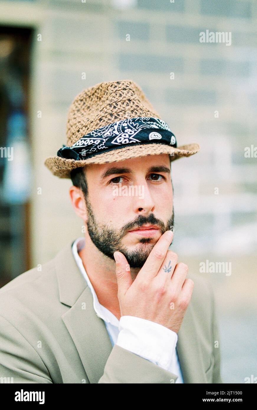Fingers touch chin hi-res stock photography and images - Alamy